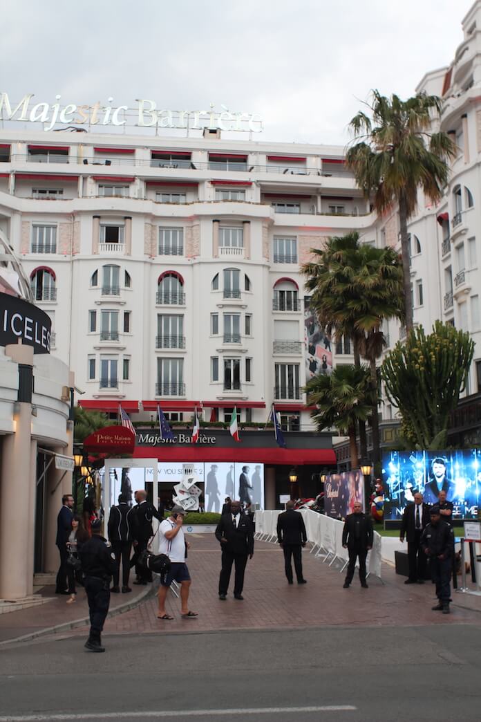 Seven bouncer, zwo police officer, a german shepherd and a bag control protect the Majestic Barriere in Cannes. 