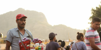 Carnival in Tepoztlán: This guy is selling cigarettes to tourists.