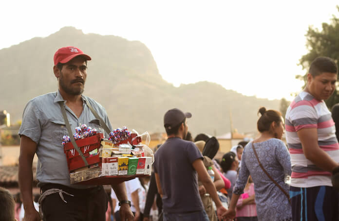 Carnival in Tepoztlán: This guy is selling cigarettes to tourists.